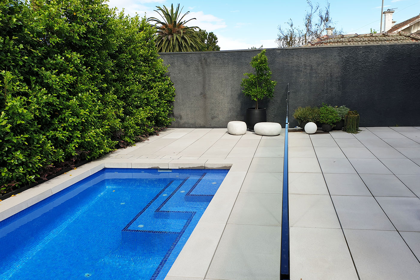 Why You Should Consider Pedestal Pavers For Your Pool • Anston